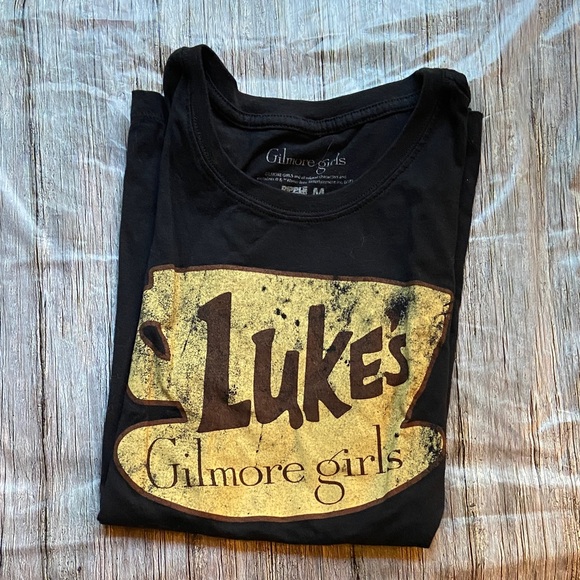 Gilmore Girls Tops - Gilmore Girls Black Tee with Gold Luke's Coffee Shop Design